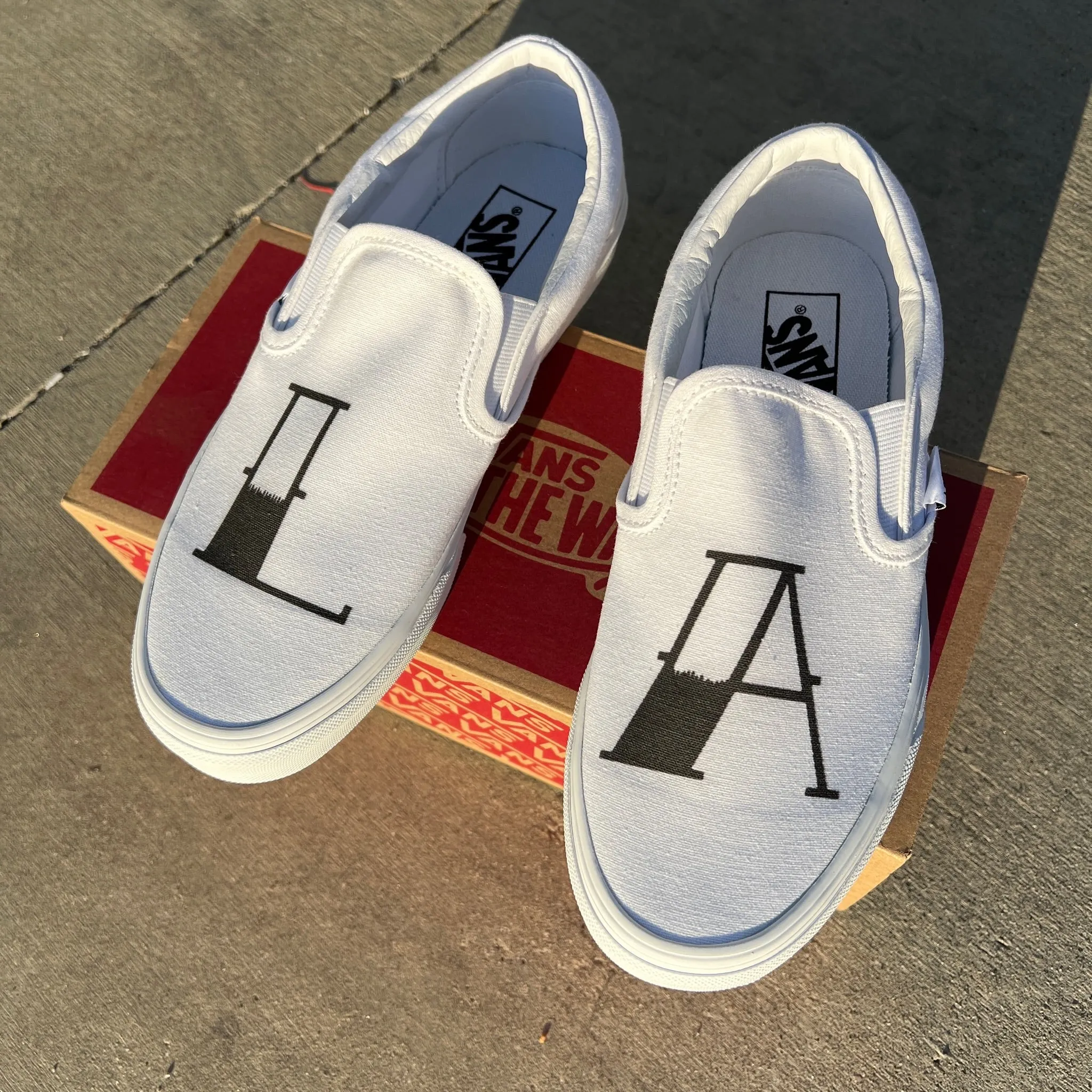 LA Custom White Slip On Vans